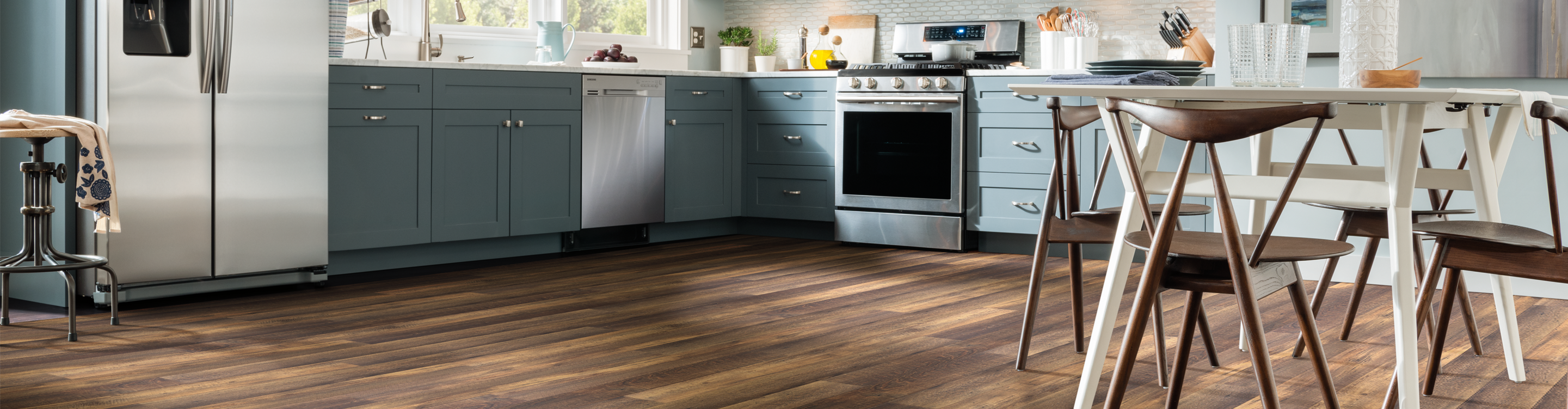 Dark vinyl plank in kitchen with flowers